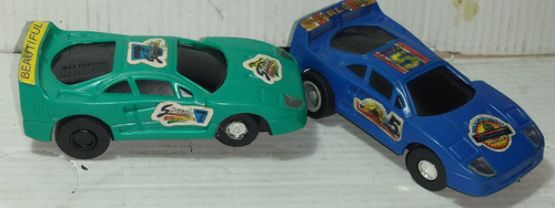 Coppia macchinine pista - di,